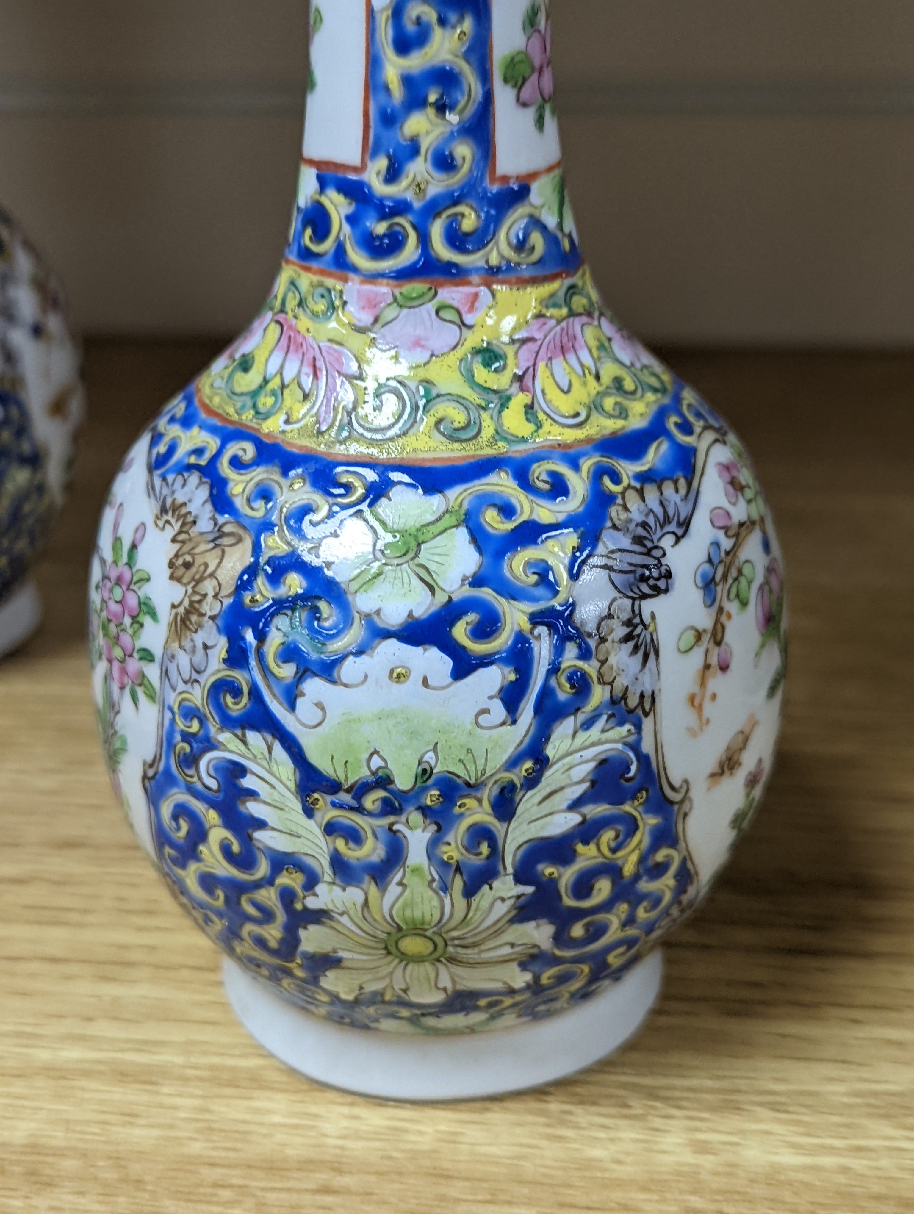 Four 19th century Chinese famille rose vases, 21cm